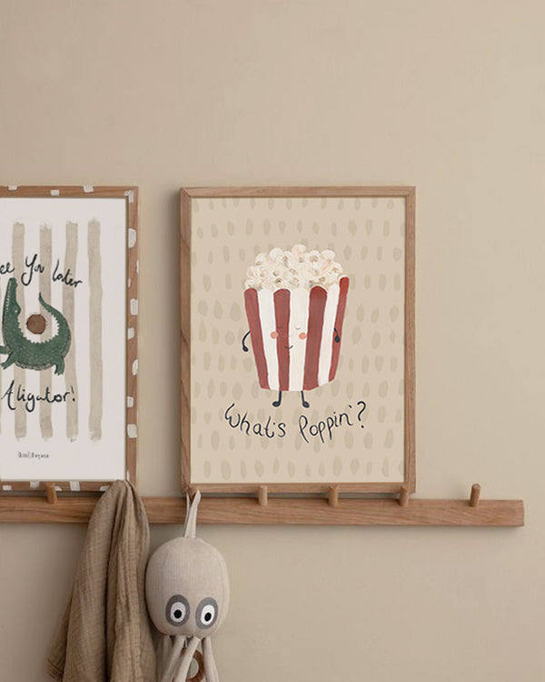 What's Poppin' word art poster styled beautifully in a minimalist modern dining area layout